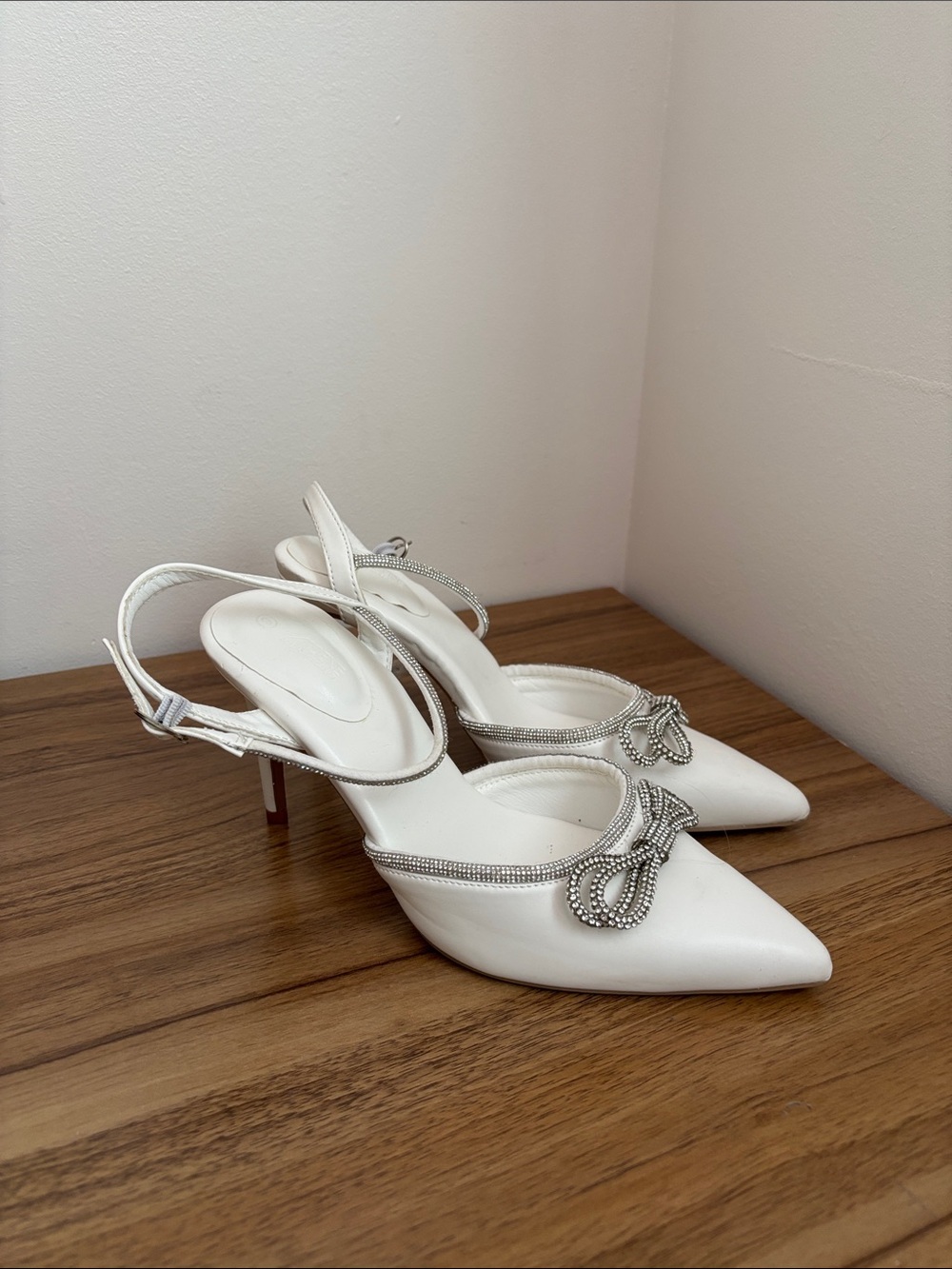 Ardene White Pointed-Toe Slingback Heels with Rhinestone Bow